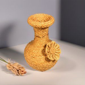 ගෝනිලනු වලින් ඔතපු මැටි පෝච්චිය